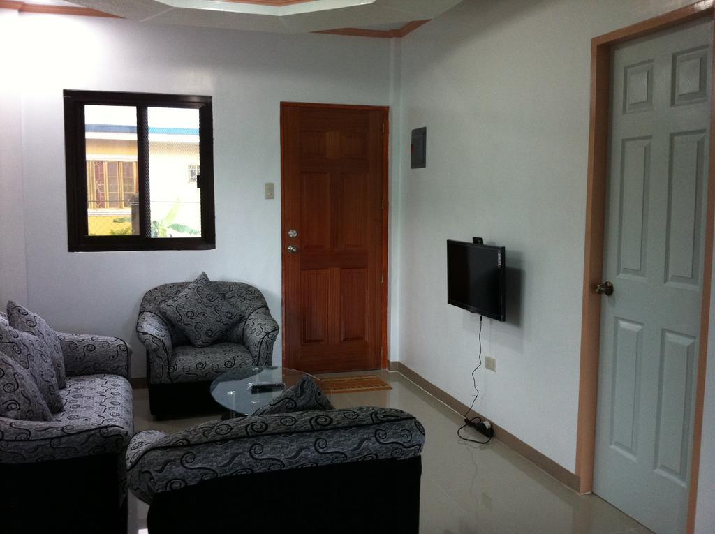 Rullan Apartelle Anda  Habitación foto