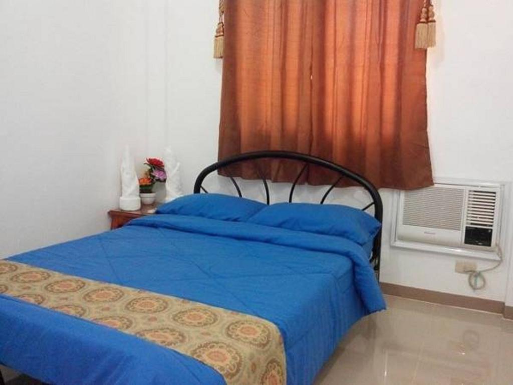 Rullan Apartelle Anda  Habitación foto