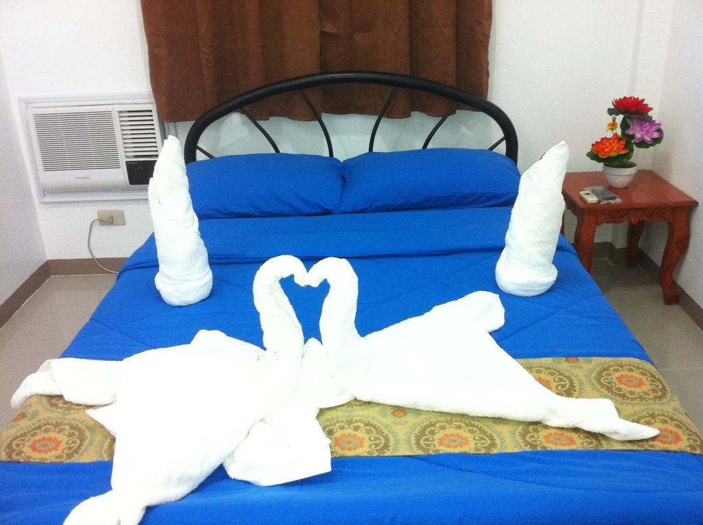 Rullan Apartelle Anda  Habitación foto