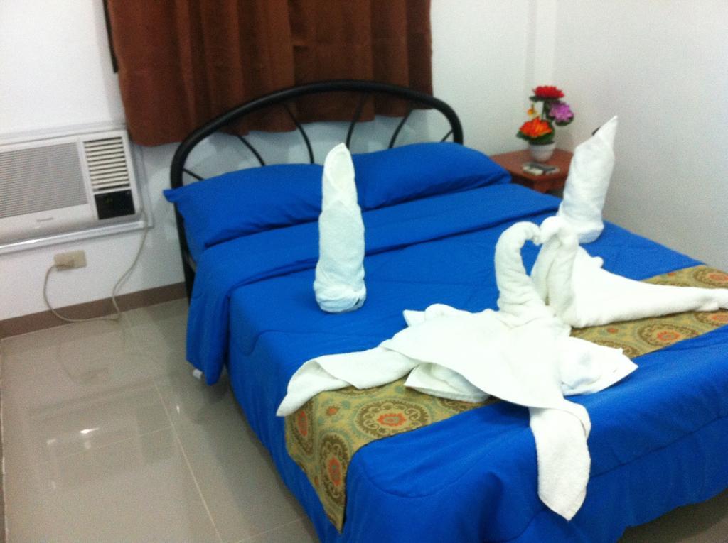 Rullan Apartelle Anda  Habitación foto